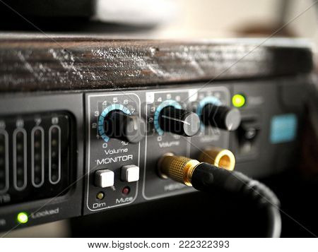 Audio Interface with Auxiliary Audio Cable and Volume Knob