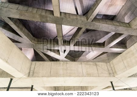 Budapest, Hungary - August 14, 2017: Interior view of Fovam ter, a Budapest Metro station in line 4. It has a modern complex structural system with reinforced concrete beams