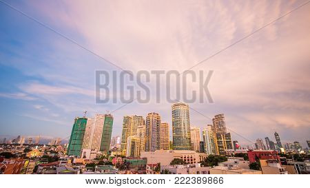 The capital of the Philippines is Manila. Makati city. Beautiful sunset with thunderous powerful clouds