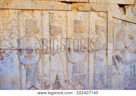 Persepolis, Iran - October 13, 2017: The Relief On Eastern Stairway Of Apadana Palace In Persepolis 