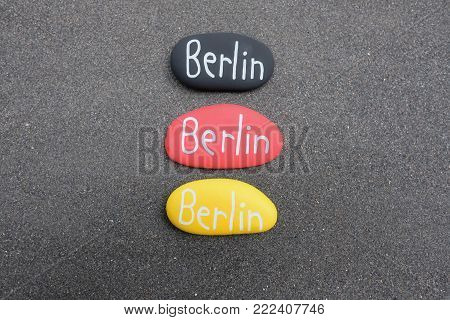 Berlin Text On Three Stones With German Flag Colors