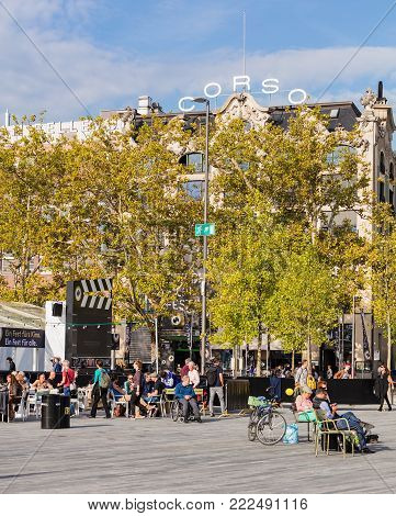 Zurich, Switzerland - 29 September, 2017: people and the venue of Zurich Film Festival on Sechselautenplatz square. Zurich Film Festival takes place annually at the end of September since 2005.