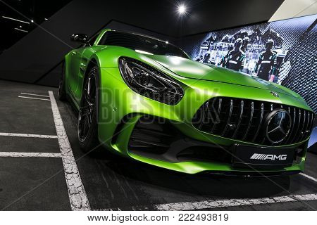 Sankt-Petersburg, Russia, January 12, 2018 : Green Mercedes-Benz AMG GTR 2018 V8 Bi-turbo exterior details, Headlight. Front view. Car exterior details