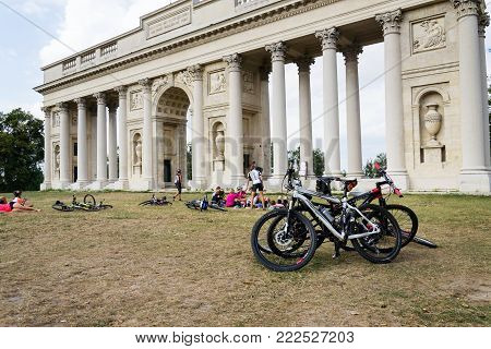 Valtice, Czech Republic - August 8: People With Bikes In Front Of Colonnade Reistna Classicist Glori