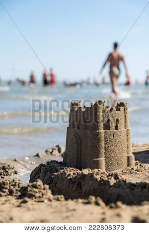 beautiful sand castle in front of the sea at the beach