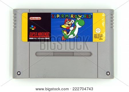 Amsterdam, The Netherlands - Januari 19, 2018: Super Nintendo Entertainment System (SNES) game cartridge of Super Mario World.