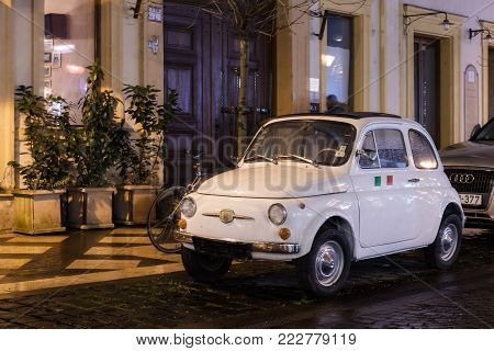Budapest, HUNGARY - Jan 19 2018: Fiat 500 vintage old car parked on street. Fiat 500 was one of the most produced European cars manufactured in years 1957-1975.