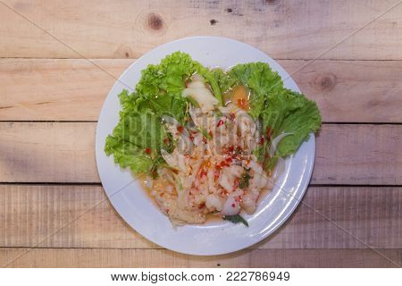 Thai Chicken Leg Salad & Spices on plate