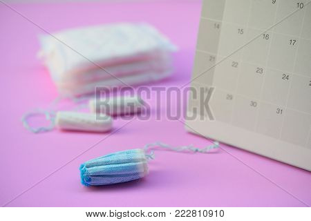 Sanitary napkins, pad (sanitary towel, sanitary pad, menstrual pad) on pink background.