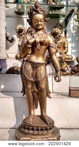 A Lady Vintage Metal Sculpture when traveling in India