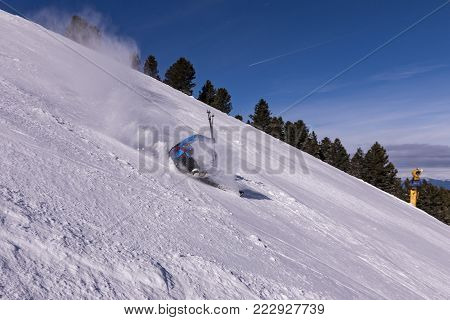 Dangerous fall on the black slopes. Skier fall on the ski slope.The fall of the skiers on the ski slope