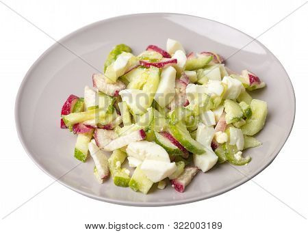 Salad With Cucumbers And Eggs On A Light Grat Plate Isolated On White Background .healthy Food . Veg