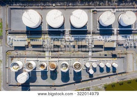 Aerial View Of Chemical Industry Storage Tank And Tanker Truck In Wailting In Industrial Plant To Tr