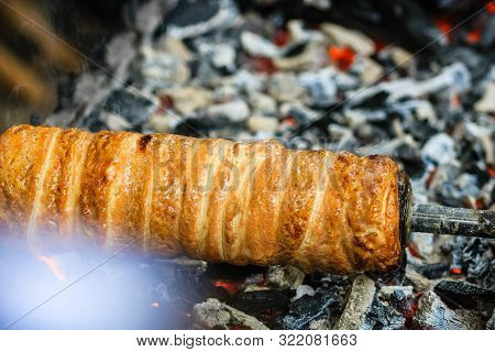 Preparation Of The Famous, Traditional And Delicious Hungarian Chimney Cake Kurtos Kolacs (kürtőskal