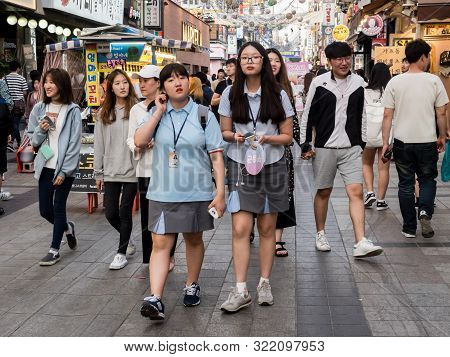 Suwon, South Korea - June 15, 2017: People Walking Along The Main Street In Suwon..