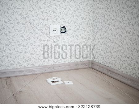 Unrepaired Electrical Outlet In The Wall In The New Empty Apartment