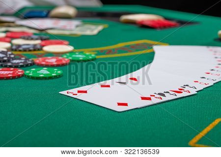 Close-up Cards For Playing Poker On A Gaming Table In A Casino A