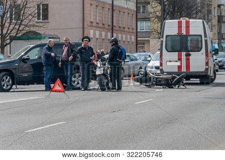 Mogilev, Belarus - April 18 2019: Car Collision, There Are Wounded. A Car And A Motorcycle Collided 