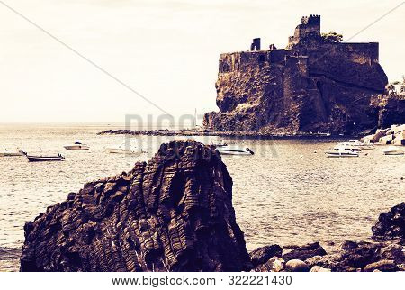 Acicastello - Ancient Norman Castle In Acitrezza On Sunset, Catania, Sicily, Italy