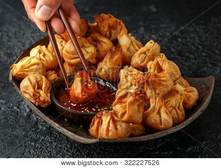 Chinese Takeaway Finger Food Vegetable Wontons With Sweet Chilli Dip Sauce And Chop Sticks