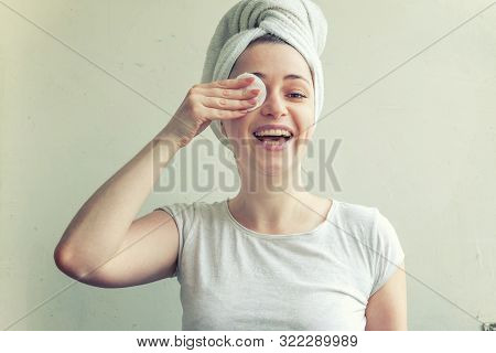 Beauty Portrait Of Smiling Woman In Towel On Head With Soft Healthy Skin Removing Make Up With Cotto