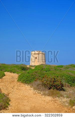 View On The Defense Tower Torre De Defensa De Alcaufar On Menorca, Balearic Islands, Spain.