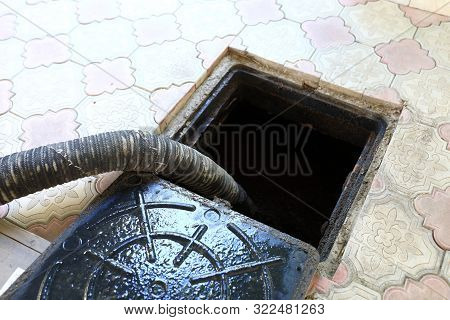 Sewer Machine Pumps Out Feces From Hole