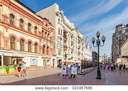 Moscow, Russia - September 13, 2019: Tourists Walking On Arbat Street At Sunny Autumn Morning. Old A