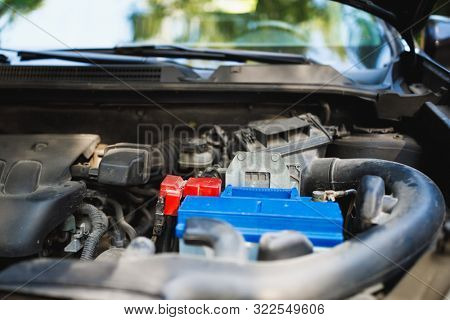 new lead-acid automotive electric battery replacement in old car