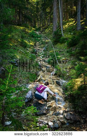 Woman In Forest Nature In Vacation. Woman In Nature. Green Forest Nature. Vacation. Natural Environm