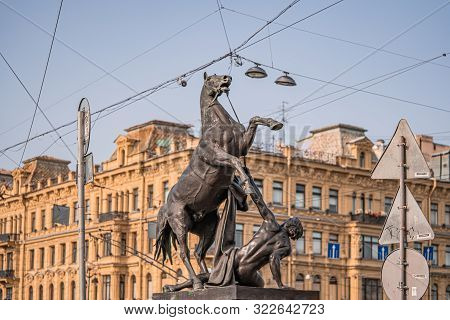 Figures Of The Klodt Horses On Anichkov Bridge In St. Petersburg On A Summer Sunny Day.