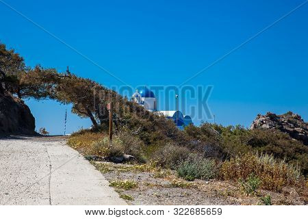 Walking Path No. 9 Between Fira And Oia And Profitis Ilias Church In Santorini Island