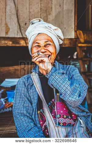CHIANG RAI, THAILAND- FEBRUARY 2019 : Daily lives of women in a white karen village, a subgroup of the Karen hilltribe in a small village near Chiang Rai, Thailand