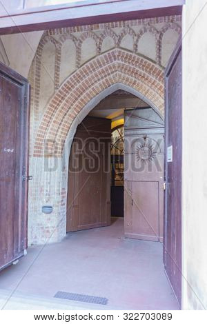 VILNIUS, LITHUANIA - JULY 30, 2019:  Facade of Roman Catholic Church of St. Anna in Vilnius (lit. Church of the Holy Onos) and  Church Of St. Francis And St. Bernard, Details, UNESCO World Heritage