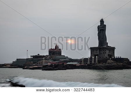 Dawn View Of The Sea From Sea Shore With Statue