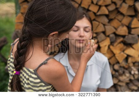 Little Brunette Girl Want To Bacome Makeup Artist, Studying To Do A Make-up On An Older Sister
