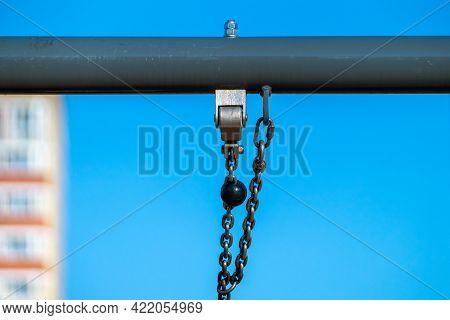 Attachment Of The Chain For Children's Swings To The Crossbar And The Presence Of A Safety (side) Ch