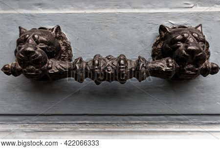European Vintage Old Metal Wrought Iron Door Knocker. Design Detail. Paris.
