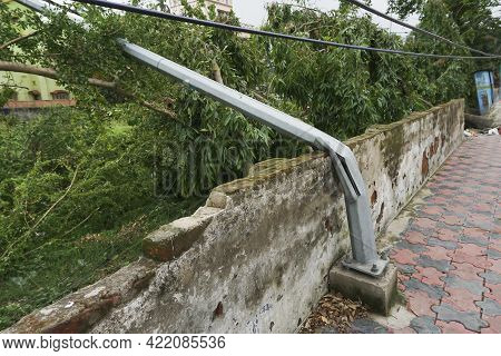 Super Cyclone Amphan ,the Force Destroyed Light Post And A Wall. The Devastation Has Made Many Damag