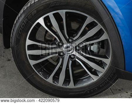 Novosibirsk, Russia - May 29, 2021: Haval F7, Car Wheel On Blue  Car - Close Up