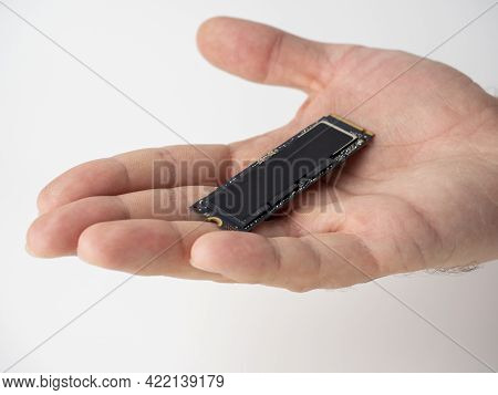 On The Male Palm Is An Ssd Disk Of The M2 Format. New Technologies For Storage And Fast Data Transfe