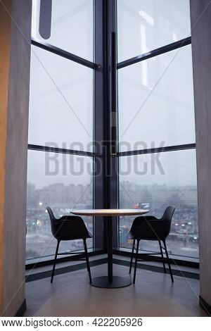 Vertical Background Image Or Table Seating By Floor To Ceiling Windows Overlooking City Skape, Copy 