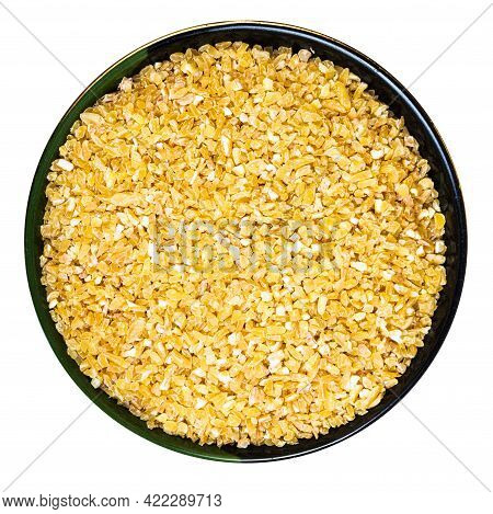 Top View Of Crushed Polished Wheat Grains In Round Bowl Isolated On White Background