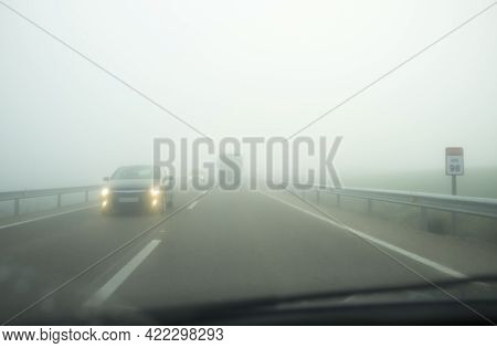 Driving Under Dense Fog. Extreme Bad-weather Conditions
