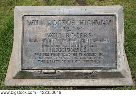 May 23, 2021 Santa Monica California: A brass plack dedicated to Will Rogers Highway in 1952. Will Rogers was a famous person and a friend to all. Editorial.