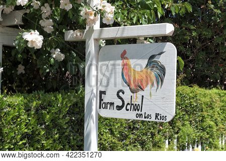 SAN JUAN CAPISTRANO, CALIFORNIA - 27 MAY 2021: Sign at The Farm School on Los Rios Street an ultimate farm to table culinary experience, hands-on cooking classes in a historic farm cottage.