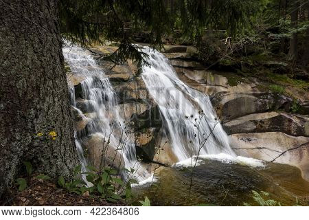 Mumlavsky Vodopad Waterfall In Krkonose (giant Mountains) And Certova Oka Geological Formation In Th