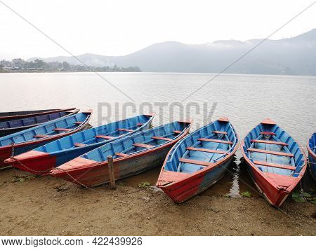 Wooden Canoe Boat Of Nepali People Floating In Phewa Tal Or Fewa Freshwater Lake Wait Service Nepale