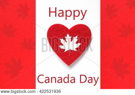 Happy Canada Day Greeting Card. Red Heart On Canada Flag