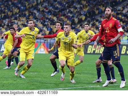 Kyiv, Ukraine - October 13, 2020: Ukrainian (in Yellow) And Spanish Players Fight For A Ball During 